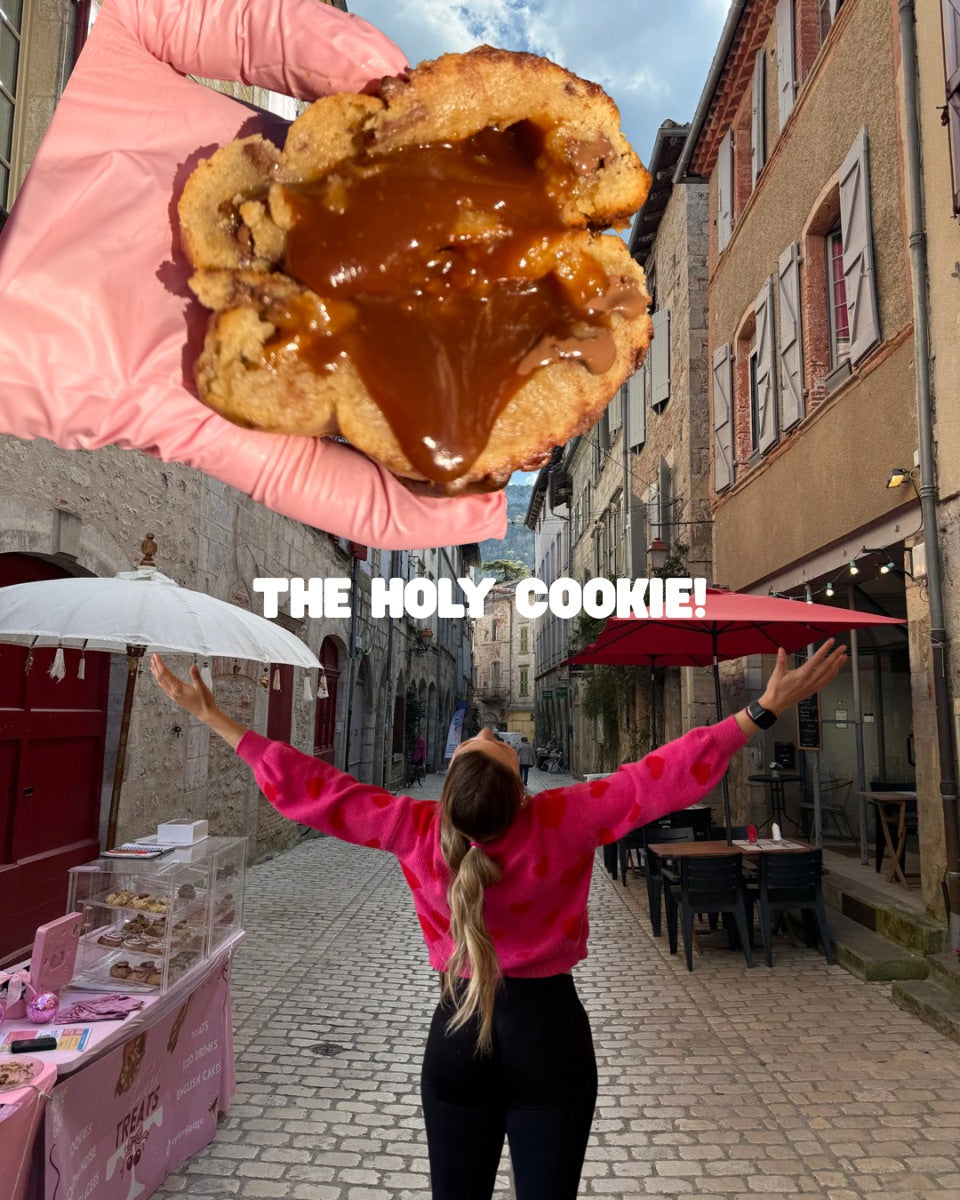 A giant stuffed cookie held up in the streets of Saint-Antonin