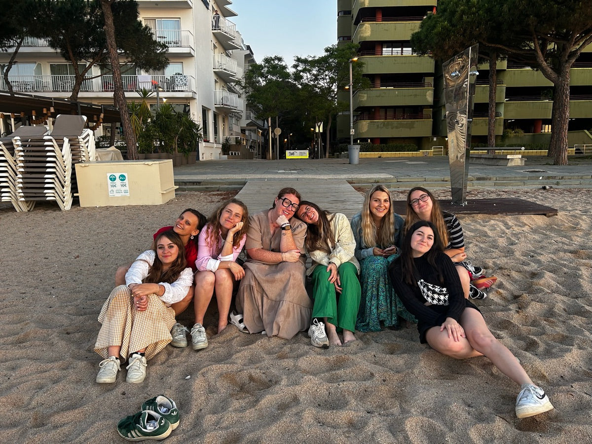 Tayler with friends on the beach