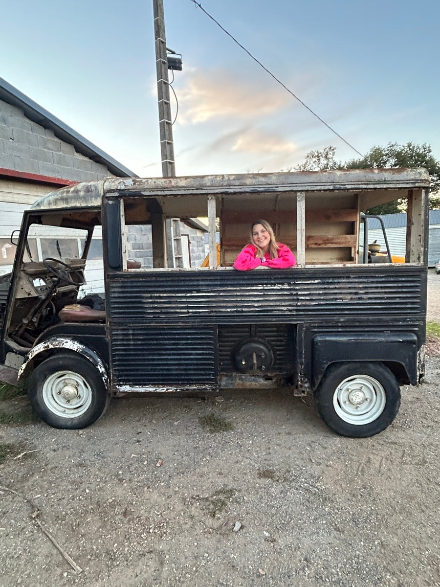 Tayler in a vintage van
