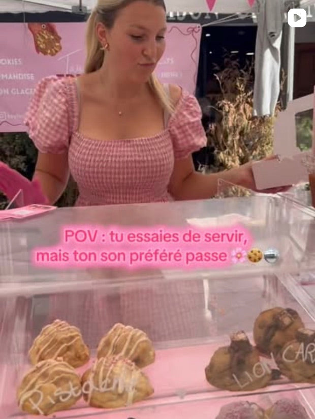 Tayler serving at the stall